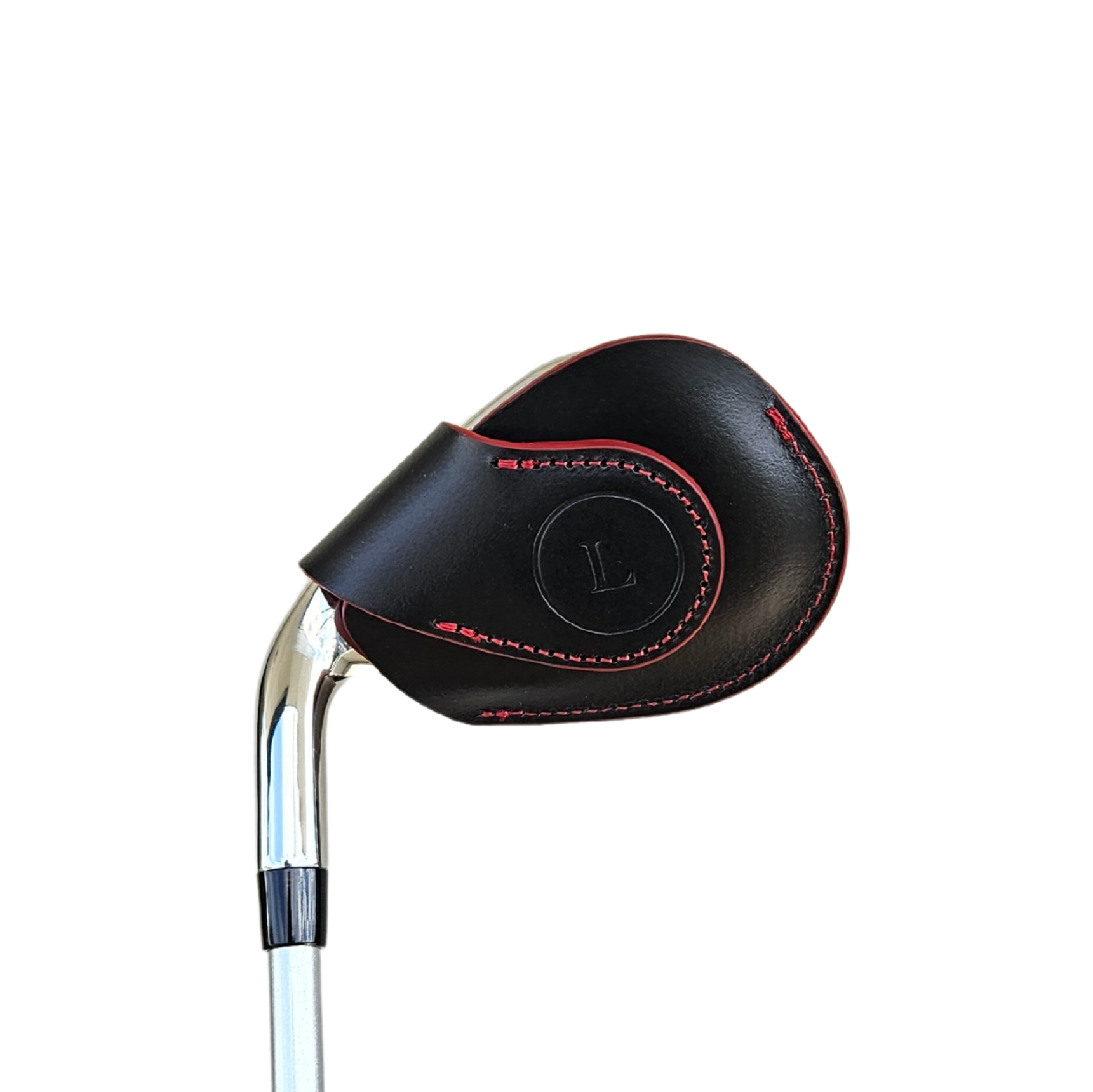 Studio shot of leather magnetic golf iron covers in black with red edges neatly arranged to showcase their smooth texture, precise stitching, and minimalist design under soft lighting.
